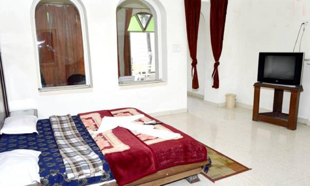 Hotel Bhajgovindam Haridwār Rom bilde